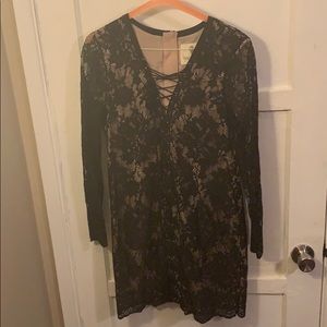 Black lace with beige with beige slip attached.